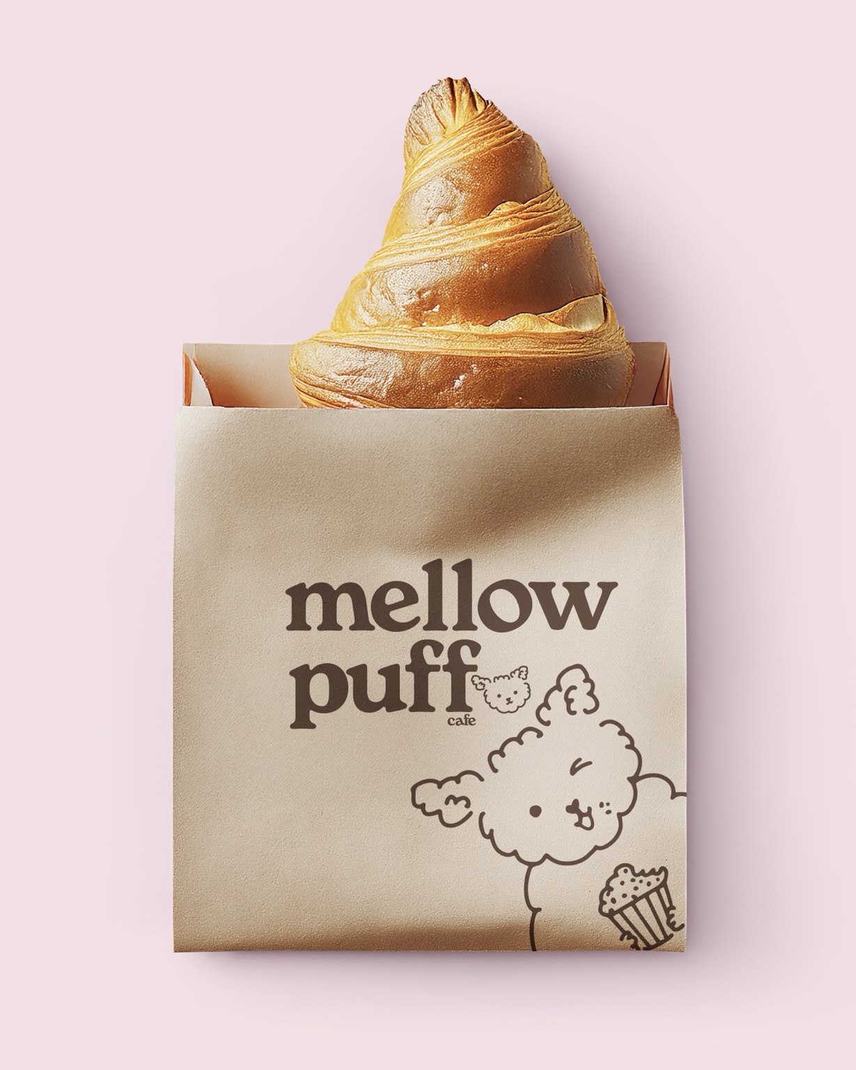 Croissant in an illustrated Mellow Puff Cafe pastry sleeve