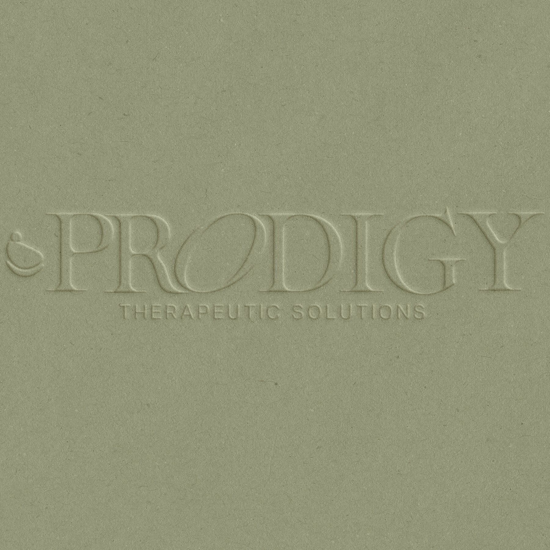 Reimagined Prodigy Therapeutic Solutions logo embossed into sage paper